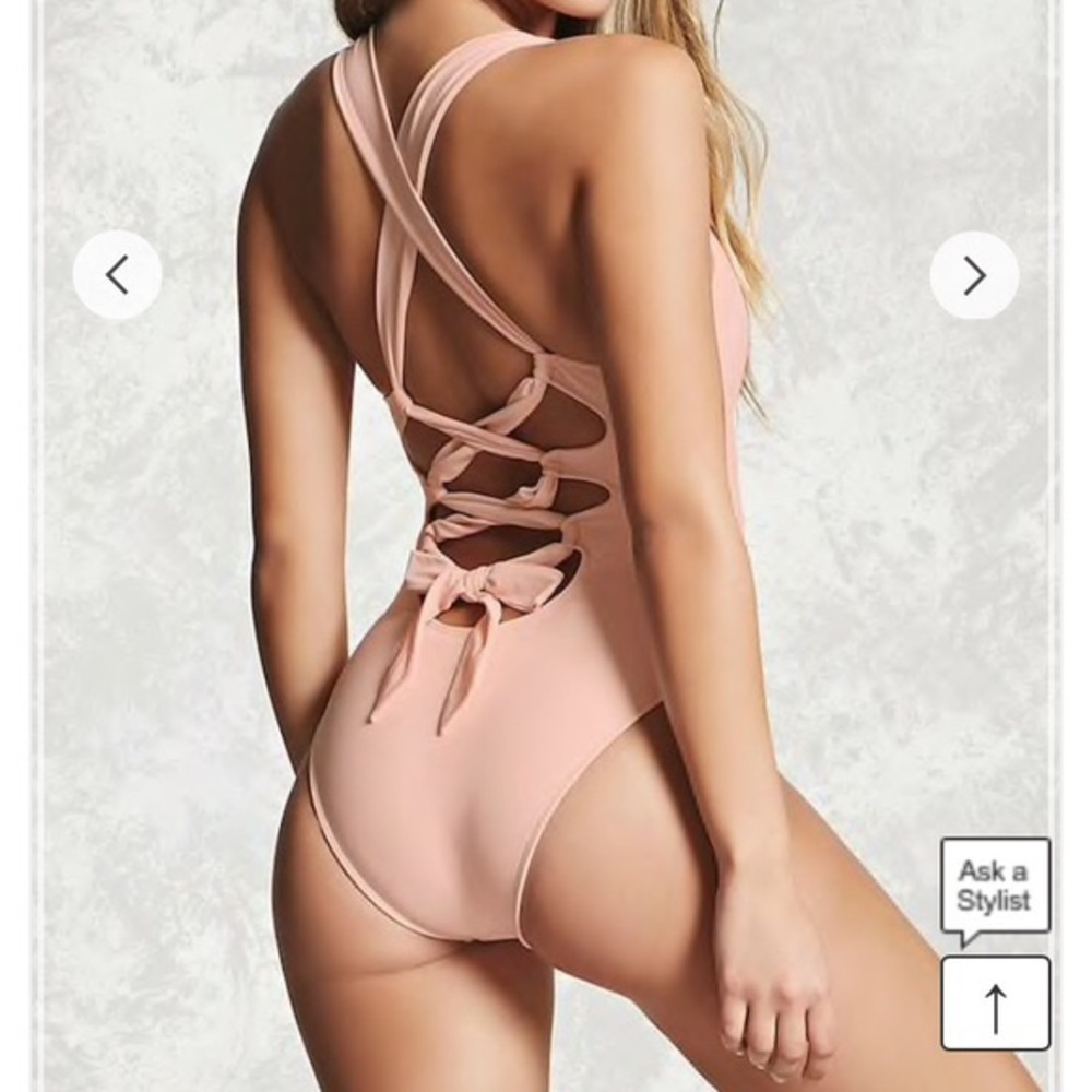 Forever 21. Blush lace up one piece swim.